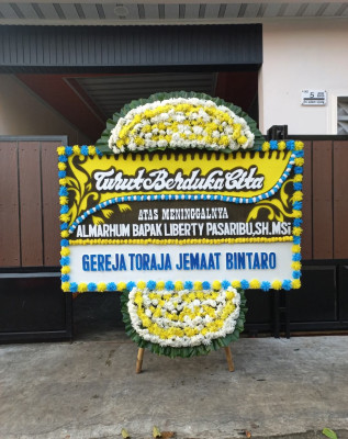 Papan Bunga Duka di Palu Barat